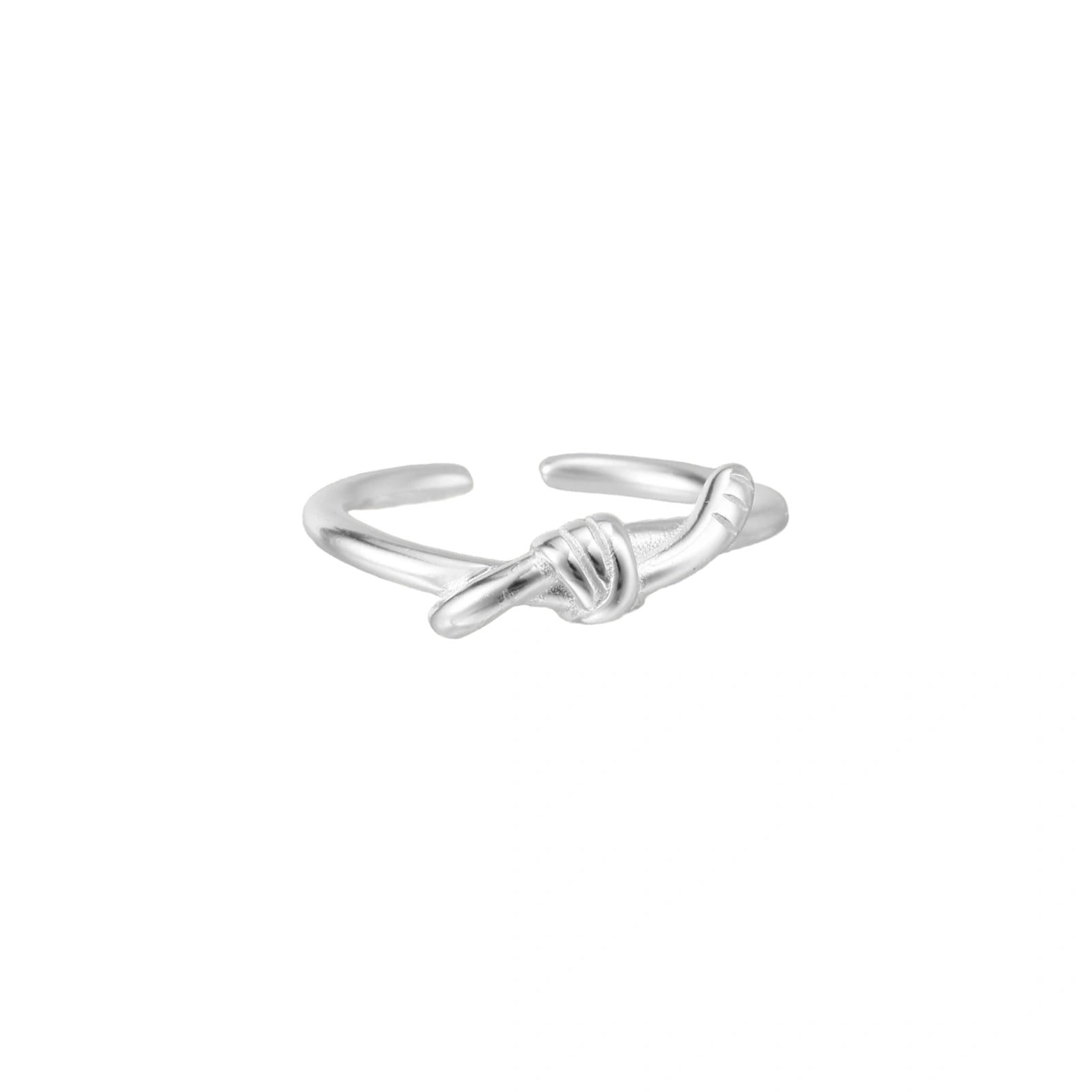 Delicate rhodium-plated silver ring with elegant knot design on cream background, adjustable band style