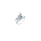 Adjustable white gold-plated ring with 3D blue enamel puppy wearing crystal crown on beige background