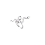 Sculptural white gold-plated snake ring with crystal accents coiling around finger in bold open design