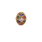 Oversized gold ring with geometric mosaic pattern featuring multicolor zirconia stones in ruby, emerald, sapphire, and clear tones.