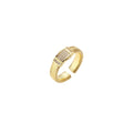 Gold-plated adjustable ring with ribbed band and rectangular pavé cubic zirconia panel on white background.