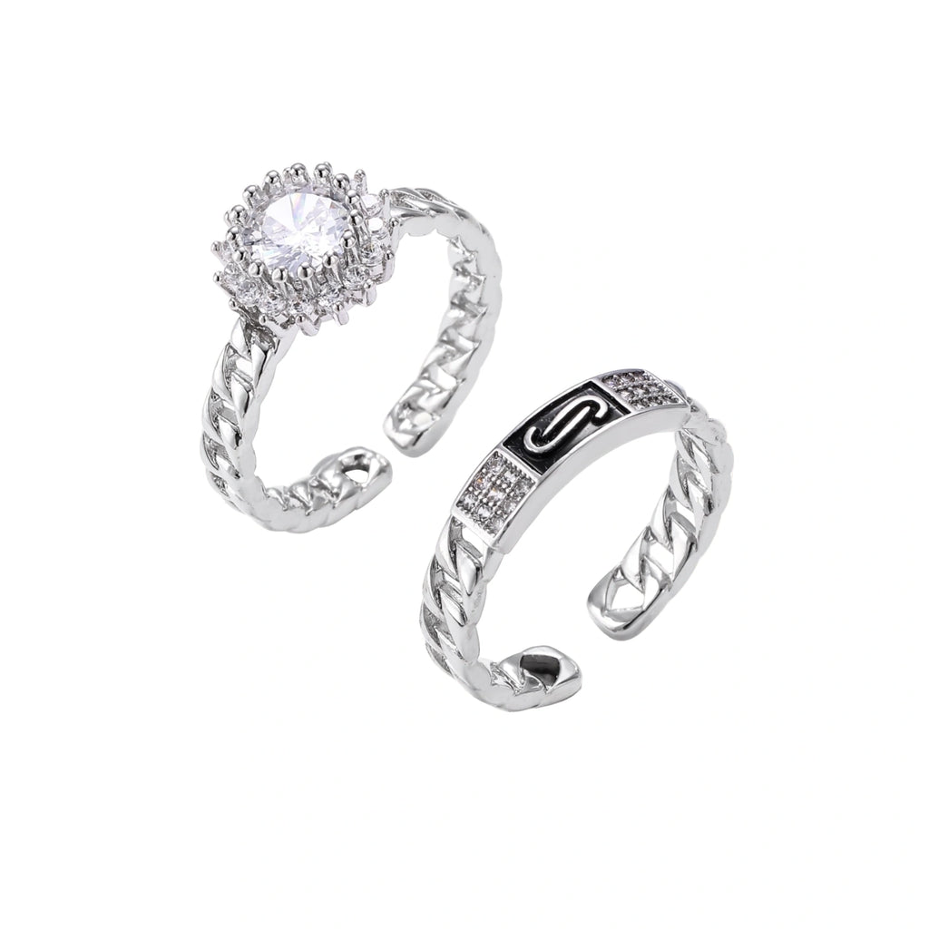 Two adjustable white gold plated rings with chain-link bands, featuring cubic zirconia halo and enamel details