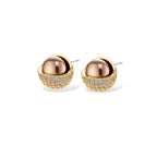 Elegant spherical pendant necklace and earrings set featuring crystal-pavé bottom half in gold or silver finish on white background.