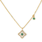 Gold-plated jewelry set with diamond-shaped pendants featuring white centers, green stones, and sparkling zirconia borders
