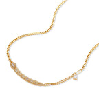 Gold-plated necklace with geometric diamond segments and matching huggie earrings featuring cubic zirconia details